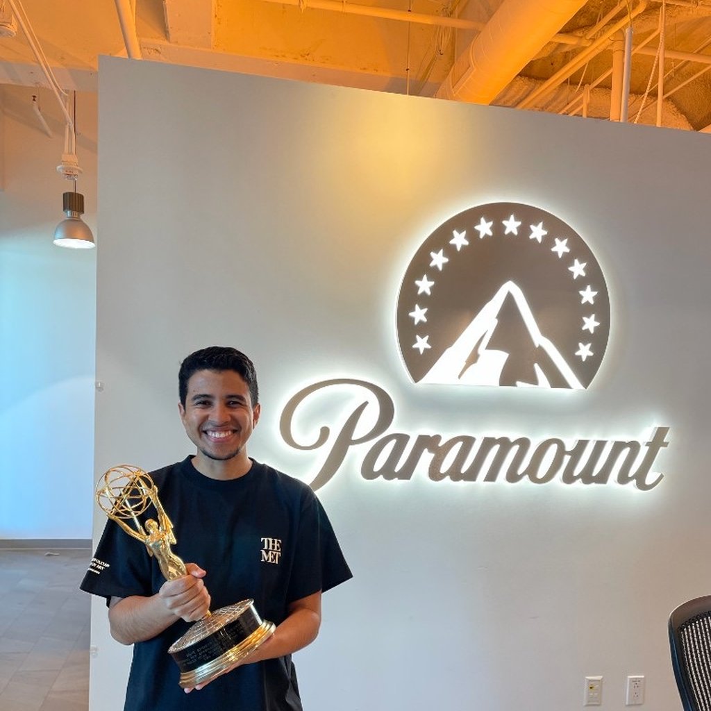 Brandon holding an Emmy at Paramount